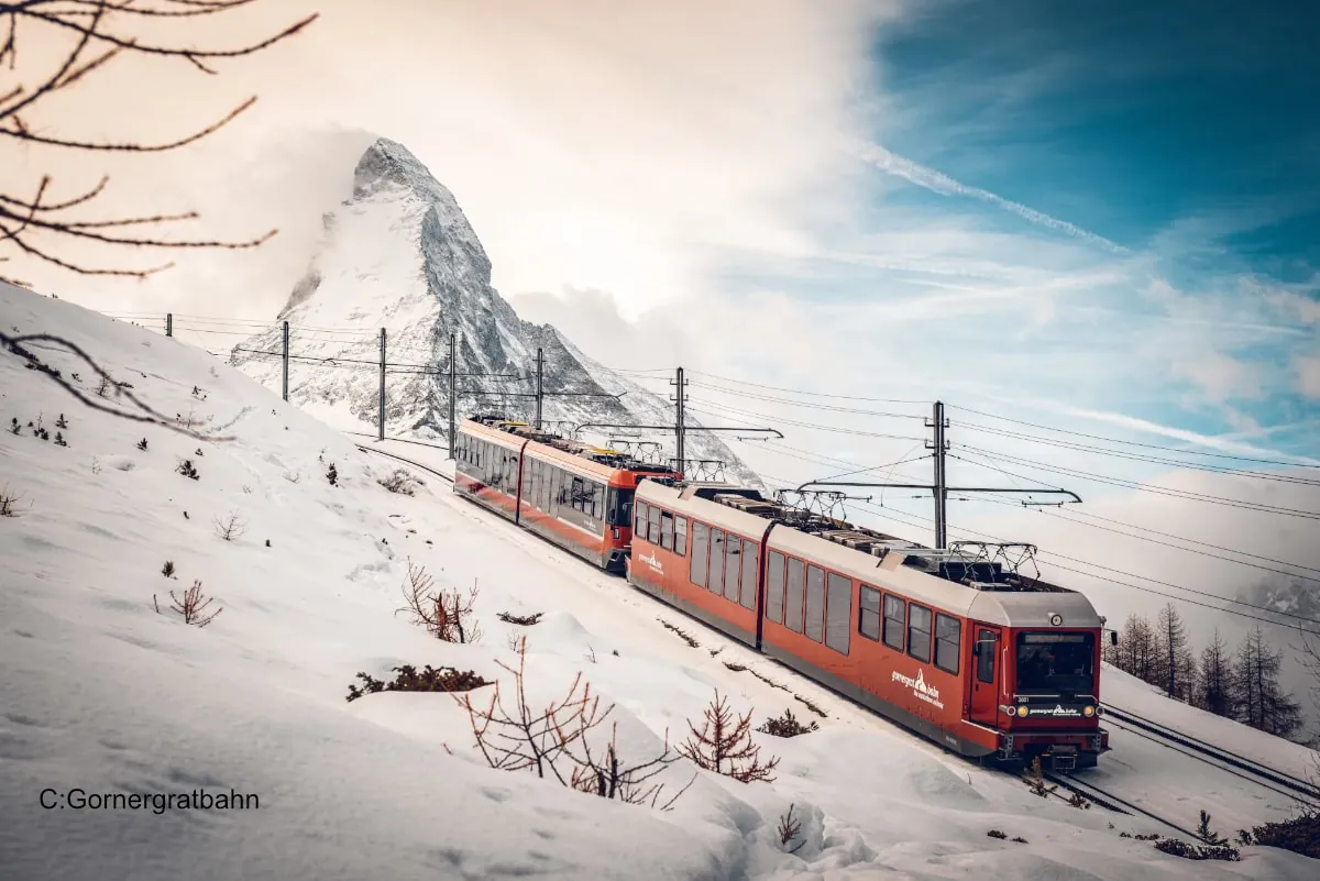 Train running in Zermatt winter